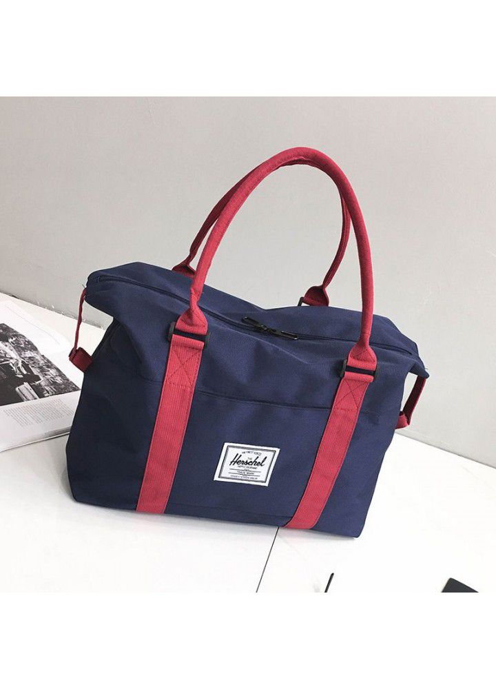 Manufacturers wholesale boarding bags, solid color, large capacity, wear-resistant and load reducing, customized hand-held travel bags, luggage bags and travel bags 